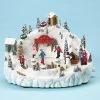 The Holiday Barn Skating Pond Music Box Christmas Music Boxes